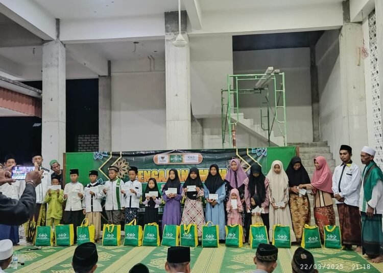 Di Pengujung Ramadan, PRNU Petiyintunggal Dukun Bersama Lazisnu Gelar Santunan Anak Yatim, Fakir Miskin, dan Dhuafa