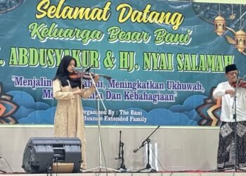 Tampilan Duet Violinis Semarakkan Halal Bihalal ke-3 Keluarga Bani H. Syakur-Hj. Salamah