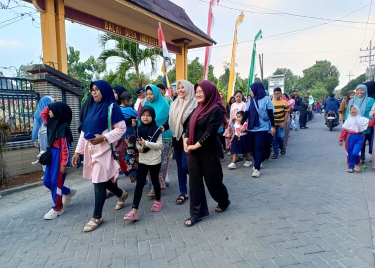 Semarak HUT RI ke-80, Ratusan Warga Desa Indrodelik Bungah Guyub Rukun Ikuti Jalan Sehat Full Doorprize