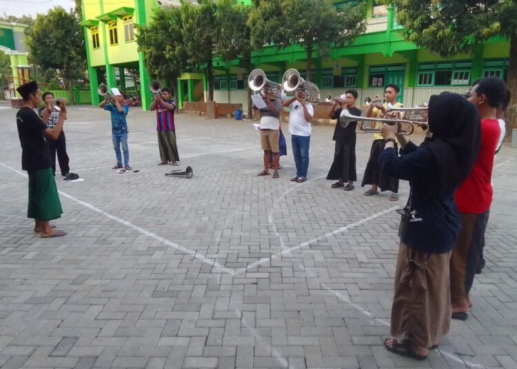 GP Ansor Tebuwung Penuh Semangat Siapkan Korsik Jelang Upacara HUT Kemerdekaan RI ke-80