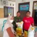 Ringankan Beban Masyarakat di Pengujung Tahun, Pemdes Tanjungan Driyorejo Gelontor Bantuan Beras dan Minyak Goreng