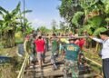 Semangat Kebersamaan Iringi Prajurit Kodim 0817/Gresik Awali Pembangunan Jembatan Garuda di Benjeng