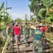 Semangat Kebersamaan Iringi Prajurit Kodim 0817/Gresik Awali Pembangunan Jembatan Garuda di Benjeng